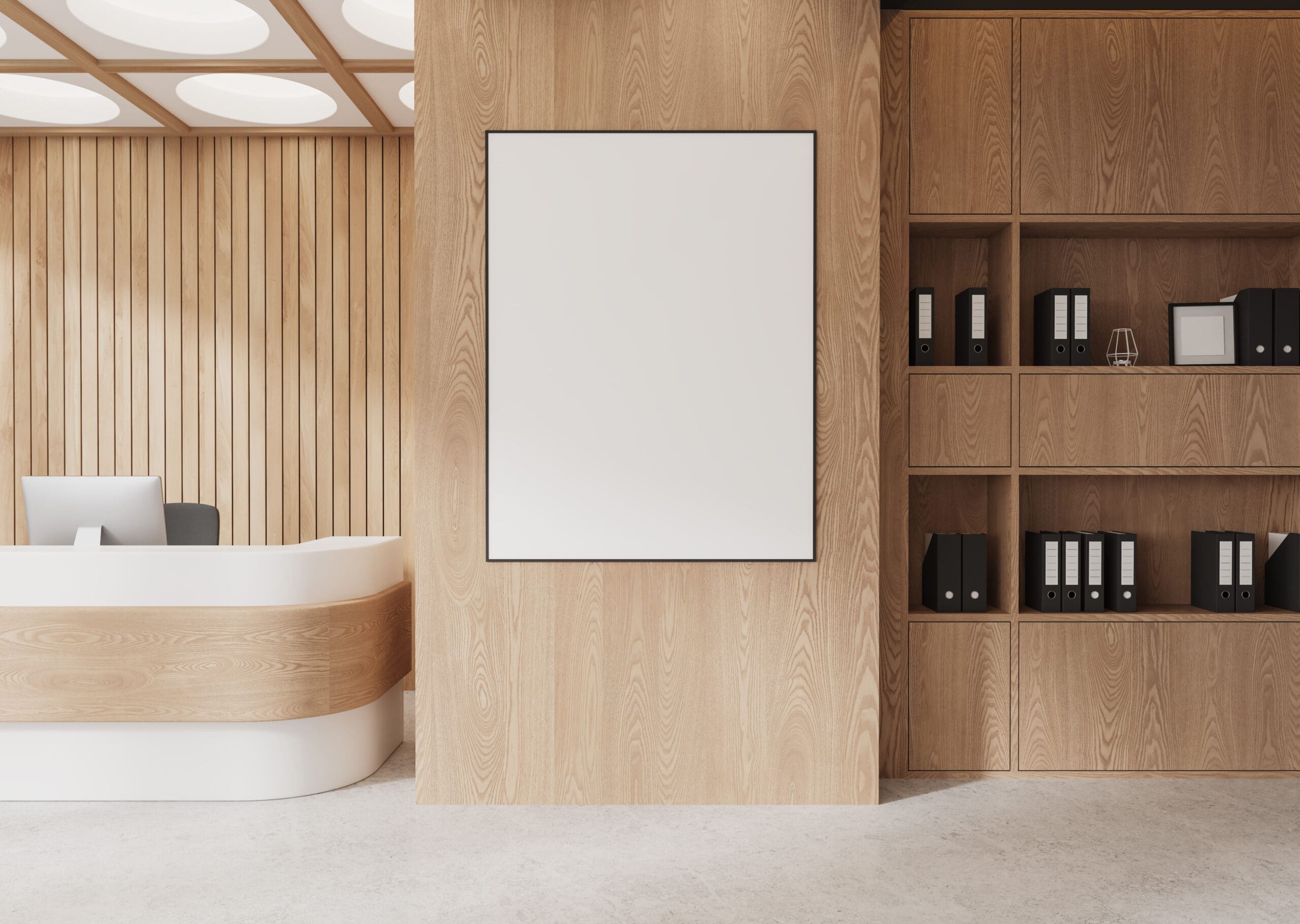 The modern office lobby features expertly crafted wooden walls and ceiling, showcasing exceptional carpentry. A sleek white reception desk stands to the left, while a blank vertical poster is centered on the wall. To the right, shelves with black binders complement the light-colored floor.